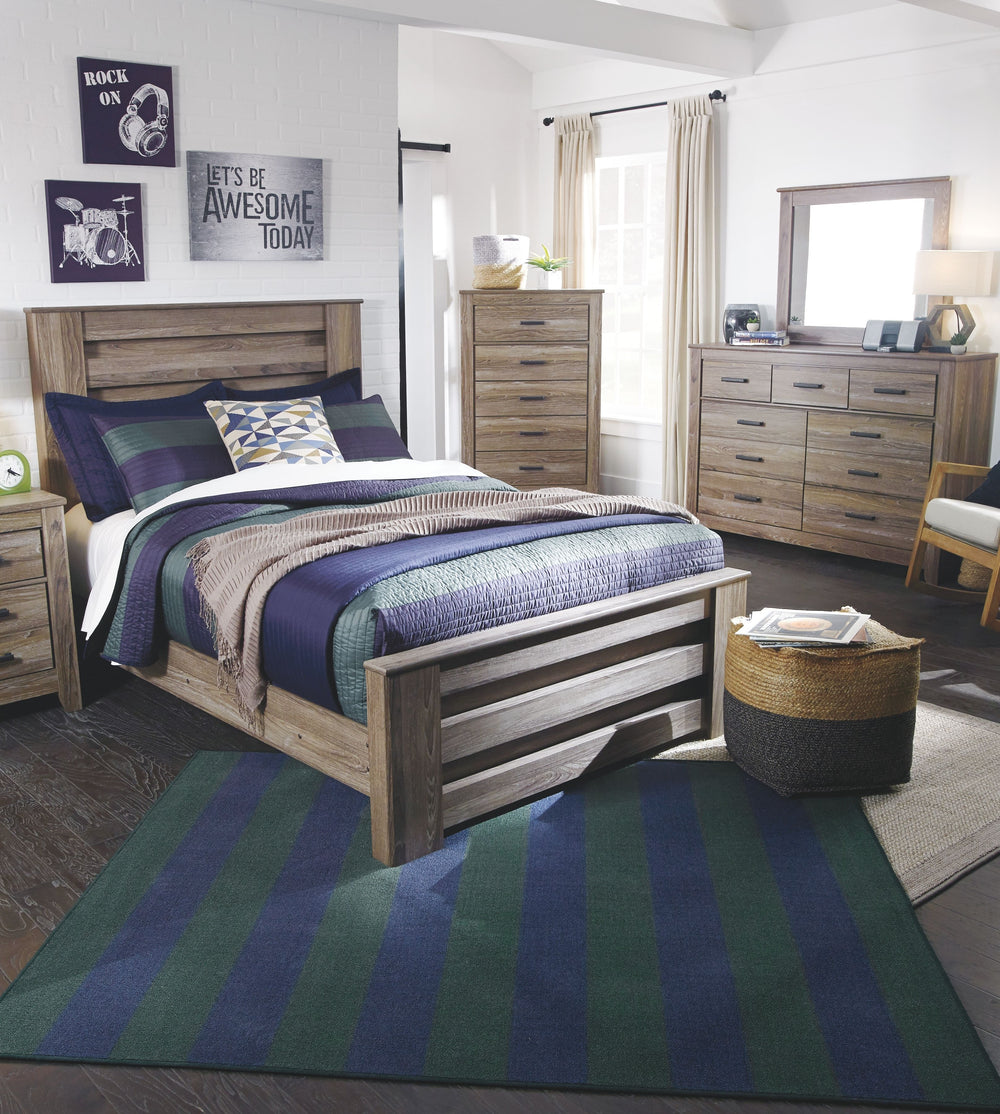 Warm gray sophisticated vintage finish with white wax effect over replicated oak grain. Tall generously scaled cases with wide pilaster, finished off with gently curved foot. Large dark pewter color handles with an aged appearance accent cases. Modern sty