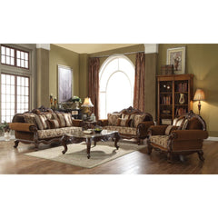 With Classic elements of rolled carved and grooved camel back leading to the center top carving, the Jardena sofa is a piece of art as well as a comfortable addition to any living room. It features an arched tight back with loose cushions, and inviting po