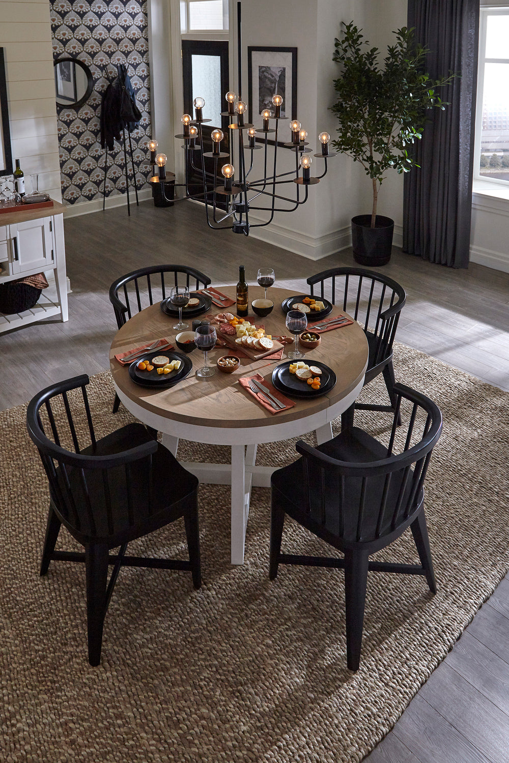 Americana Modern Dining 48-66" Round Dining Table and 4 Black Barrel Chairs