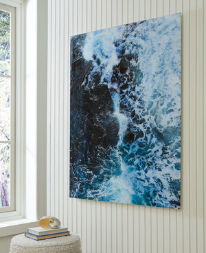  this print on glass reminds you of the tide pulling out to sea. Swirling turquoise hues form a mesmerizing image of the ocean with foamy white caps. Perfect for ocean lovers or coastal cottages