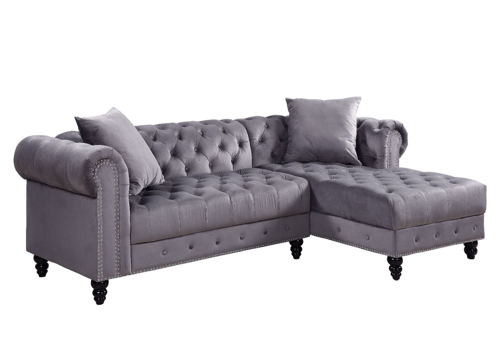 Create a chic living room with the Adnelis sectional sofa. It is beautifully upholstered in lustrous velvet. It is designed with spectacular attention to fine details such as button tufting and nail-head trim accents. The rolled armrests add a regal touch
