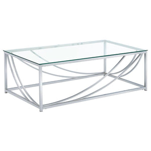 This rectangular coffee table boasts a modern design with a clear tempered glass top that highlights its sleek aesthetic. The sturdy metal frame, finished in electroplated polished chrome, features gracefully curved accents for an elegant touch. Its minim