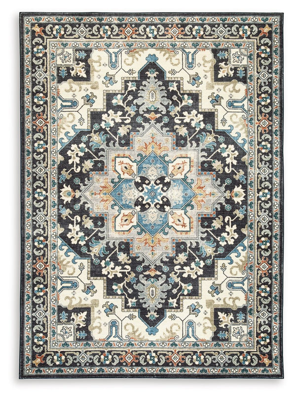 Chic traditional style is made all the more convenient with this rug. It showcases a brilliant medallion pattern, weaving together dark and light tones for incredible dimension. No need to sweat spills and messes: Simply toss this rug into the washer for 