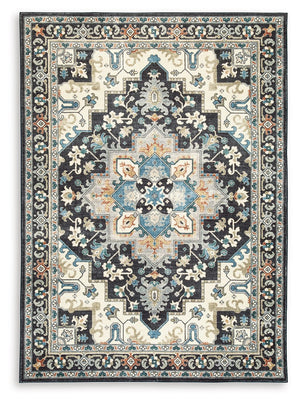 Chic traditional style is made all the more convenient with this rug. It showcases a brilliant medallion pattern, weaving together dark and light tones for incredible dimension. No need to sweat spills and messes: Simply toss this rug into the washer for 
