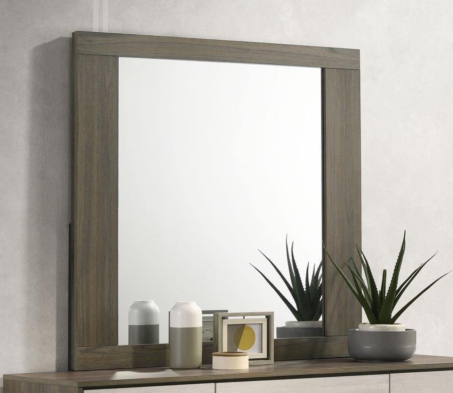 Complete your bedroom-'s sophisticated look with this contemporary dresser mirror. Designed to perfectly complement the matching dresser, this mirror features a sleek melamine frame that blends natural wood tones for a modern aesthetic. The large reflecti