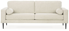 Simple comfort meets modern function in this sofa. An apt addition to apartments and other small spaces, the slim-profiled piece welcomes you with its cozy character. A subtle chevron pattern on the cushions refresh the classic neutral hue, elevating the 