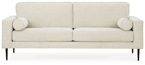 Simple comfort meets modern function in this sofa. An apt addition to apartments and other small spaces, the slim-profiled piece welcomes you with its cozy character. A subtle chevron pattern on the cushions refresh the classic neutral hue, elevating the 