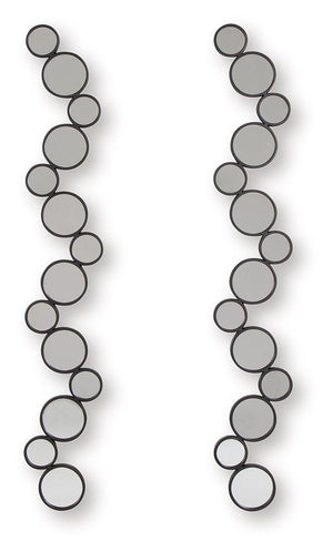 Time to refresh your walls? This accent mirror set is ready to introduce some modern whimsy. A playful arrangement of circular mirrors creates a unique and eye-catching design, while the black frames add a sleek, sophisticated touch. You can hang them fou