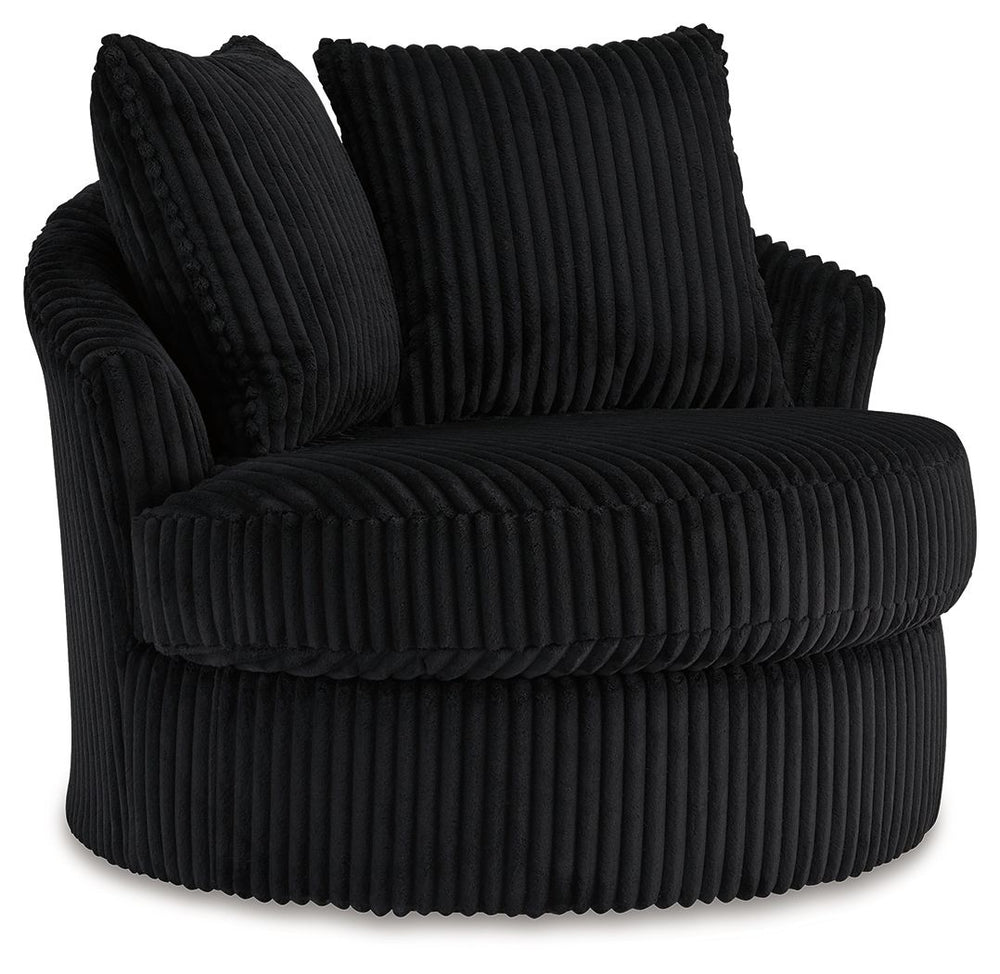 This swivel chair takes style and comfort full circle. Its plush, neutral corduroy upholstery is casually cool and beautifully on trend, while throw pillows elevate the cozy factor. A smooth-gliding 360-degree swivel lets you go with the flow. Come on, yo