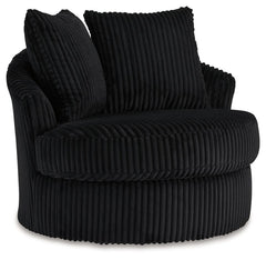 This swivel chair takes style and comfort full circle. Its plush, neutral corduroy upholstery is casually cool and beautifully on trend, while throw pillows elevate the cozy factor. A smooth-gliding 360-degree swivel lets you go with the flow. Come on, yo