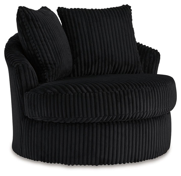 This swivel chair takes style and comfort full circle. Its plush, neutral corduroy upholstery is casually cool and beautifully on trend, while throw pillows elevate the cozy factor. A smooth-gliding 360-degree swivel lets you go with the flow. Come on, yo
