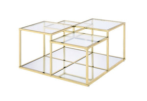 Modern simplicity makes your space feel uncluttered and stylish. The Uchenna Coffee Table has a brilliant color and lustrous finish to enhance it-'s sleek modern silhouette. Metal table frame in a gold finish exudes lustrous shine, topped with tempered gl