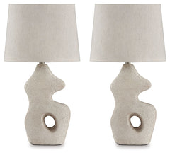 Effortless with a fashionable edge. This table lamp lights your home with an organic texture thatâ€™s wonderfully easy on the eyes. Its sculpted body provides a worn, textural aesthetic that looks beautifully refined in the right setting.<br><br><b>Additi