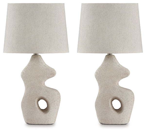 Effortless with a fashionable edge. This table lamp lights your home with an organic texture thatâ€™s wonderfully easy on the eyes. Its sculpted body provides a worn, textural aesthetic that looks beautifully refined in the right setting.<br><br><b>Additi