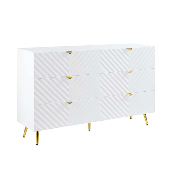 The Gaines Collection is a glamorous and sophisticated grouping that adds a chic style to any room. The white gloss finish and gold metal accents help to accentuate the clean lines of the pieces and add a pop of glamour. The diagonal line design adds visu