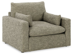 On the days when rest and relaxation seem out of reach, this oversized chair provides a positively plush seating experience. Its feather-fiber blend cushions invite you to float away in cloud-like comfort. Striking granite-hued upholstery and a streamline
