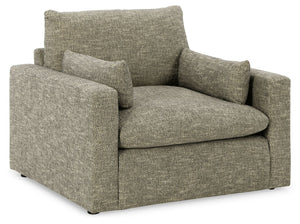 On the days when rest and relaxation seem out of reach, this oversized chair provides a positively plush seating experience. Its feather-fiber blend cushions invite you to float away in cloud-like comfort. Striking granite-hued upholstery and a streamline