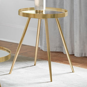  providing a sleek and reflective finish. The sturdy metal frame is finished in gold electroplated metal