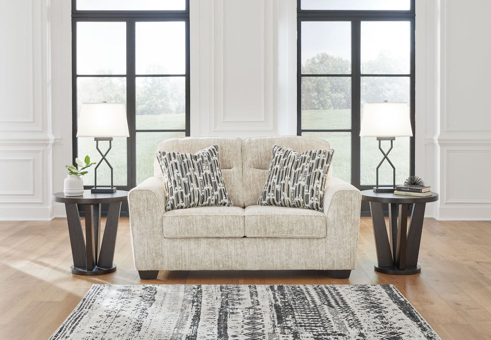 This loveseat speaks to those drawn to fresh, contemporary style with richly neutral appeal. Subtle and sophisticated, the plush upholstery and dark tri-block legs are a natural complement for so many color schemes. Two accent pillows make the seating eve