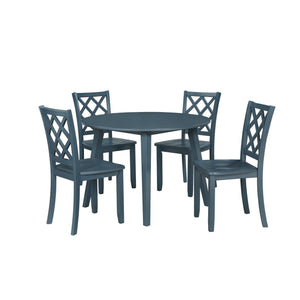 The Trellis 5 Piece Round Dining Set in blue is a superb choice for those looking to add a blend of style and functionality to their dining area. This set includes one round dining table and four chairs, all constructed from solid rubberwood, manufactured
