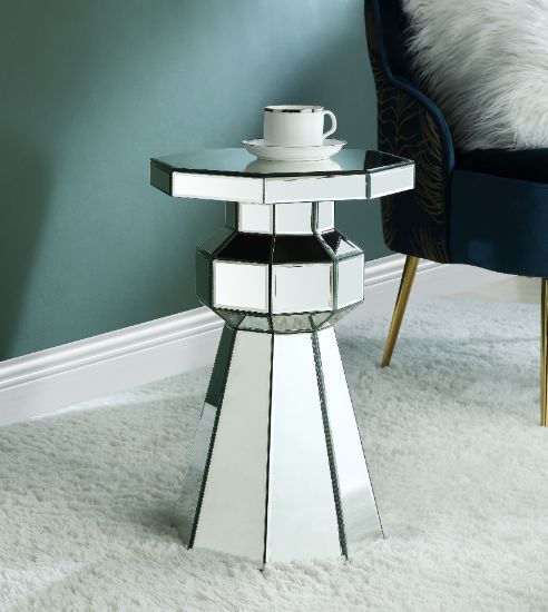 Balance your room decor with this glitzy modern work. Unique design brings modern glamour to your room areas. This beautiful mirrored pedestal features a attractive polygon base, adding depth and dimension to your room design. It-'s multi-layered look can