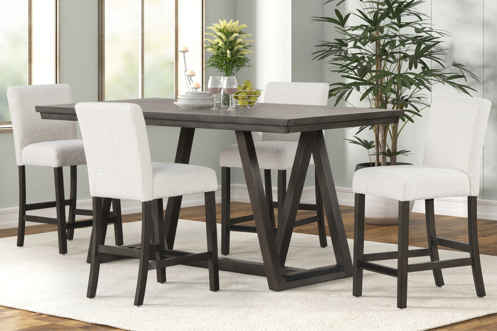 The High Line 5 Piece Counter Dining Set is the perfect blend of style, durability, and comfort for your home. This set includes a counter-height trestle table and four white upholstered counter chairs, designed to meet all your dining needs. Expertly cra