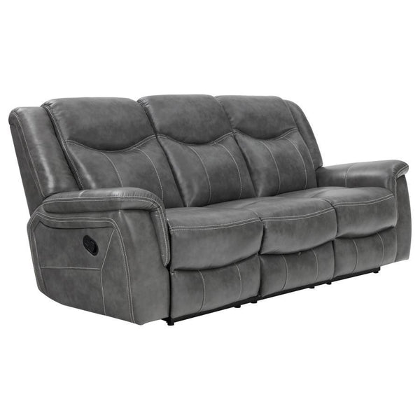 Grey is the trendy color these days and it doesn-'t look any better than on this opulent motion sofa. It features angled seat backs with extra padded headrests for ultimate luxury. Armrests and even the leg rest on the recliner are padded for extra comfor