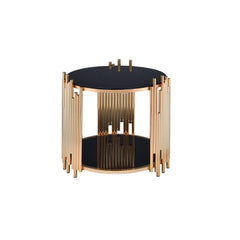 Add a fashion-forward touch of geometry to your living room with the asymmetrical metal tubing detail of the Tanquin black mirror end table. This contemporary piece sits on a circular metal drum base with a gold finish and lower shelf. Some Assembly Requi
