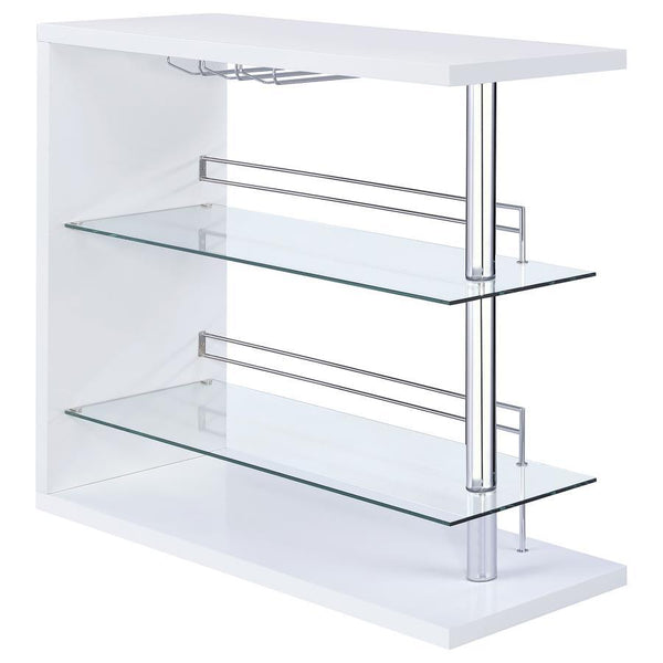 This contemporary bar unit will instantly elevate your hosting abilities. Convenient and versatile, it includes two glass shelves to accommodate your choice of beverages. It comes complete with a handy wine glass rack, allowing you to keep all your barten