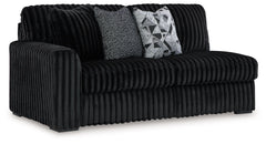 This left-arm facing sofa is made with polyester upholstery. Pairs with other items in the series to make a sectional.<br><br><b>Additional Dimensions</b><br><ul><li>Arm height: 27-"</li><li>Seat depth: 25-"</li><li>Seat height: 22-"</li><li>Top of cushio