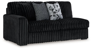 This left-arm facing sofa is made with polyester upholstery. Pairs with other items in the series to make a sectional.<br><br><b>Additional Dimensions</b><br><ul><li>Arm height: 27-"</li><li>Seat depth: 25-"</li><li>Seat height: 22-"</li><li>Top of cushio