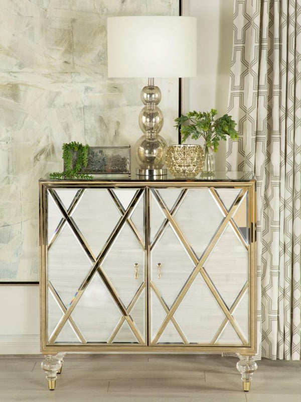  glam accent cabinet. Covered almost entirely in mirror surfaces