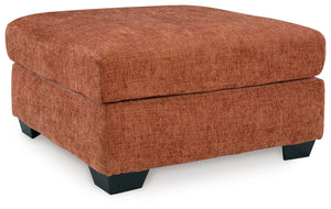 Looking to make a bold statement with color? Liven up your living room with this oversized ottoman. Its trend-right burnt orange upholstery adds a playful pop of color to your decor. Pairing posh style with everyday comfort, this piece is a welcome additi