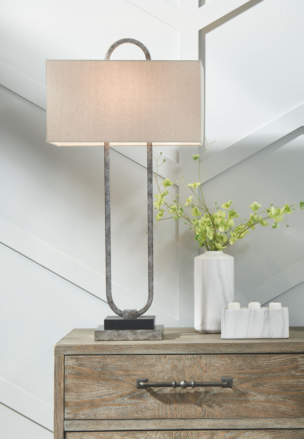  draws the eye and is visually stunning. The antiqued silver metal body with rectangular hardback shade completes the look. This table lamp is sure to be a showpiece wherever you use it.<br><br><b>Additiona