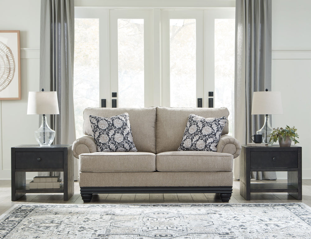 This loveseat suits those searching for a fresh take on versatile style, seamlessly transitioning from casual to modern with your decor. Its flexible character comes courtesy of a chunky fabric. Matte black wood trim creates innovative contrast. A virtuos