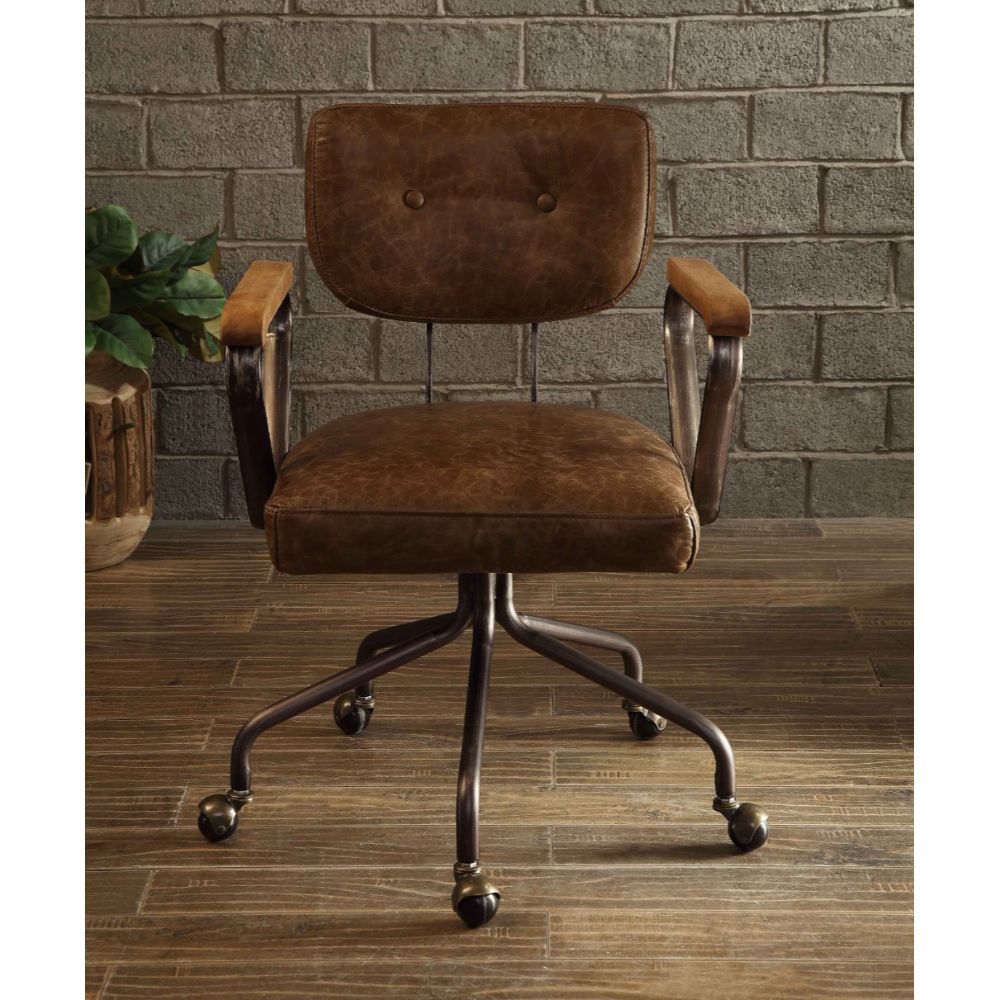 Our durable Hallie office chair gets its industrial look from oversized button tufted back and vintage top grain leather. The 5-star swivel base fitted with casters, it keeps you moving from one task to the next. Some Assembly Required.<br/><br/><b>Produc