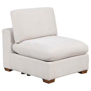 Bring a touch of modern elegance to your living space with this armless chair, a key component in creating a versatile and stylish sectional. Upholstered in soft, smooth fabric, this chair blends seamlessly into both contemporary and transitional decor se