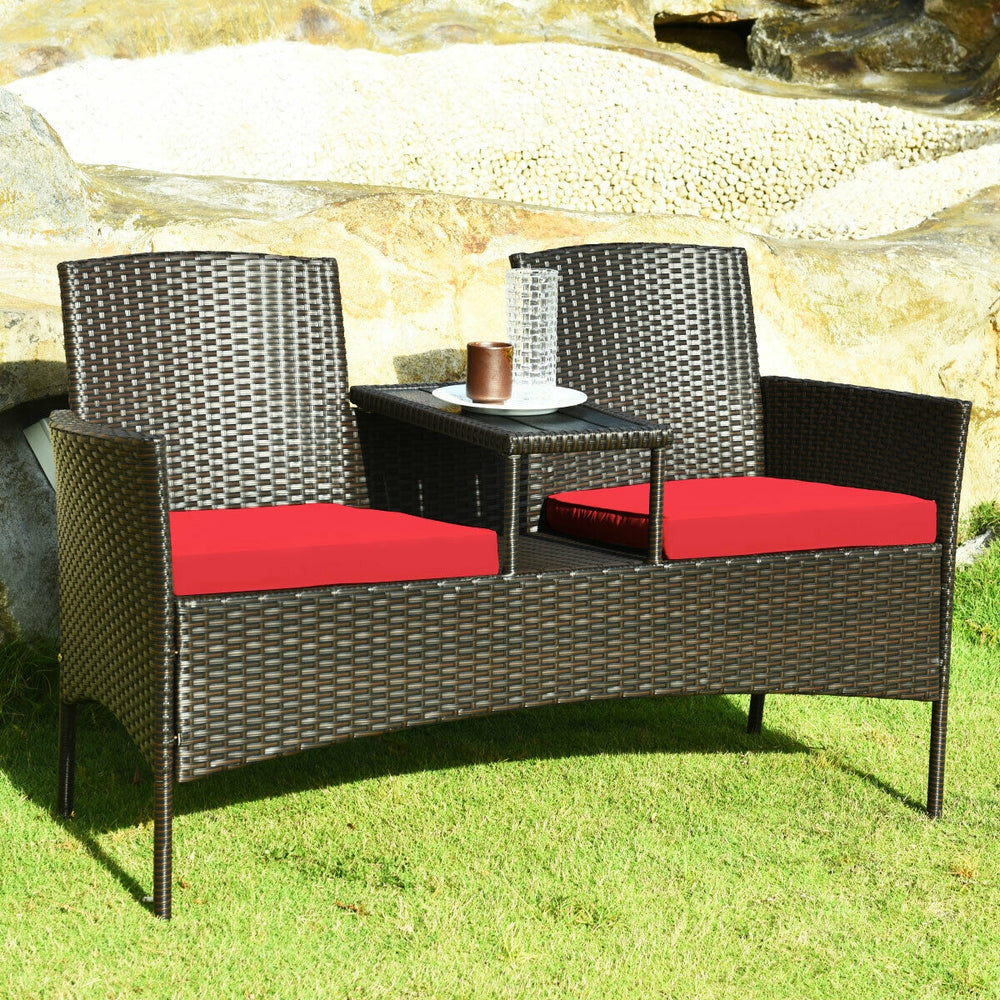 Made of high quality rattan with strong built-in frame structure<br>Poly table top is durable and safe to use<br>Trapezoid coffee table between two seats is practical<br>Cozy thick cushions double your comfy<br>The cushion cover with zipper is removable a