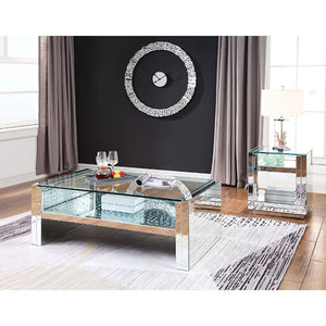  this brilliant rectangular occasional table showcases a distinctive style for an intriguing look. The table features a fully mirrored sled base with an exq