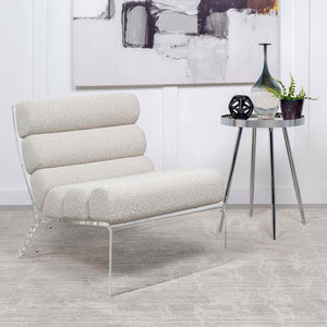  where horizontal channeling meets the rich texture of bouclÃ© fabric. The thick
