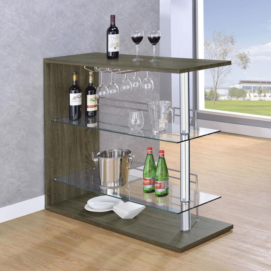 Take home entertainment to the next level with the versatile beauty of this lovely metal bar unit. With class, grace, and exquisite taste, it lends effortless glamour to a living or dining area. Equipped with a handy stemware rack and two tempered glass s