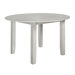 Discover the Pascal Wood Round Dining Table in Driftwood Gray, a refined and versatile addition to any dining area. Crafted from a durable combination of solid Rubberwood and manufactured woods, this table promises long-lasting stability and strength. Its