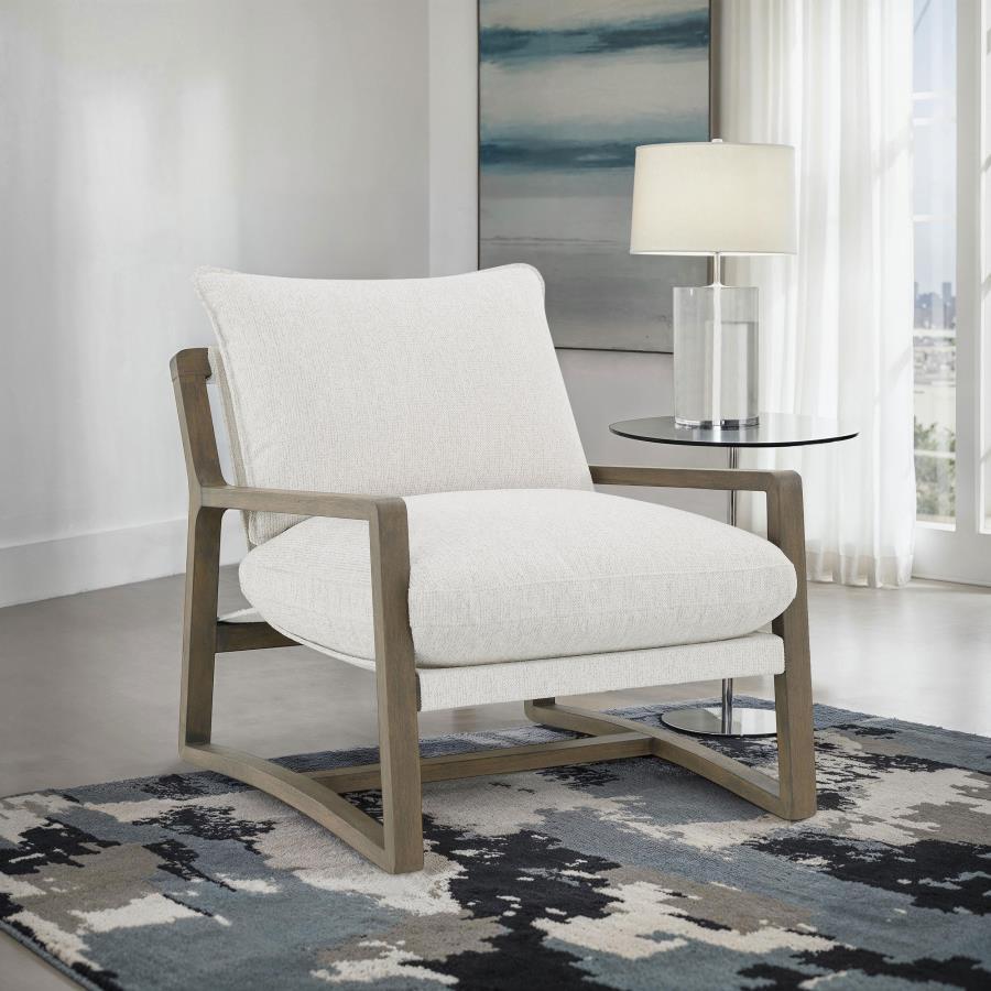 Elevate your seating arrangement with this modern accent chair, crafted to complement the comfort and style of contemporary interiors. Upholstered in soft, sand-toned bouclÃ© fabric, it sits atop a solid wood frame finished in ash brown, delivering stabil