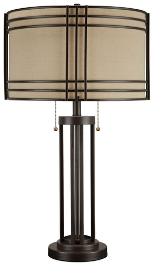 Add a touch of rustic industrial style to your decor with this eye-catching table lamp. Its drum shade and decorative metal frame bring an appealing touch to your home. A dark brown finish complements the shade-'s lighter neutral color, making this lamp i