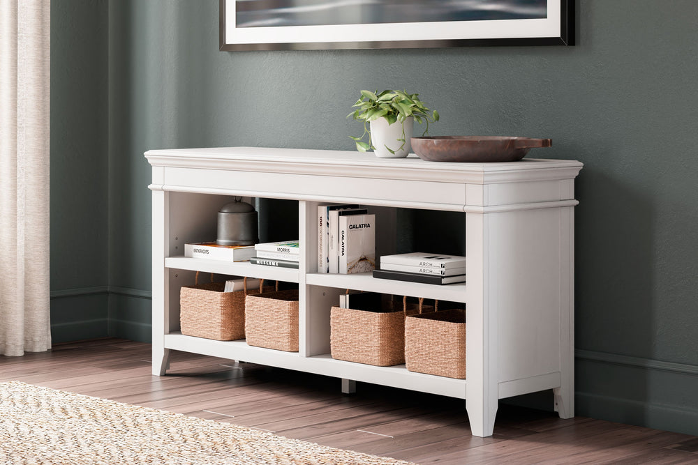 Make a style statement with this home office credenza. Its traditional design is updated with an on trend distressed whitewash finish. The credenza-'s open storage and adjustable shelving add up to a well-organized workspace.<br><br><b>Additional Dimensio