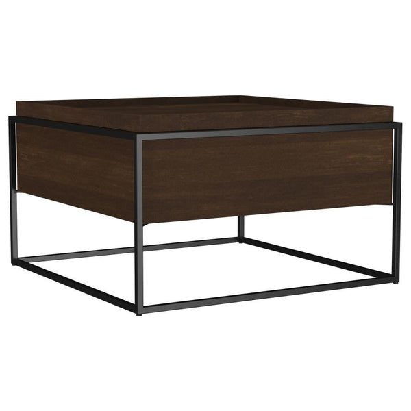 This cocktail coffee table showcases a seamless blend of solid mango wood and an iron frame, creating a balance of industrial style and rustic warmth. The expansive tray-top surface provides ample space for decorative pieces, books, or beverages, while a 