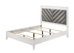Sleep in style with this modern Chelsie bedroom collection. The sturdy bed is a focal point on its own with its gray channel-tufted headboard and tapered legs. Add depth and reflect light with its silver trim that is featured throughout the bed and case g