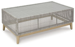 This coffee table invites your casual contemporary style outdoors. With its resin wicker in a chic neutral hue, it expertly marries refined design with durability. Breezy summer mornings and cold winter nights are made all the more enjoyable with a glass 