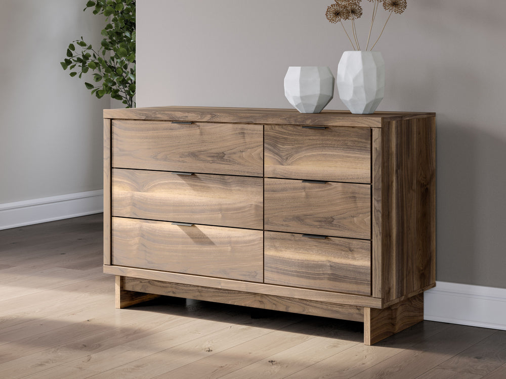 Nostalgic style, retooled for todayâ€™s trends. This dresser puts an elevated twist on mod aesthetics. Its warm brown tones reflect the mid-century vibes you love, while the angular base incorporates contemporary motifs. Integrated drawer handles round ou