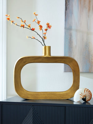  it ushers a confidently curated vibe into your space. The goldtone finish brings an eye-catching metallic flair to your mantel
